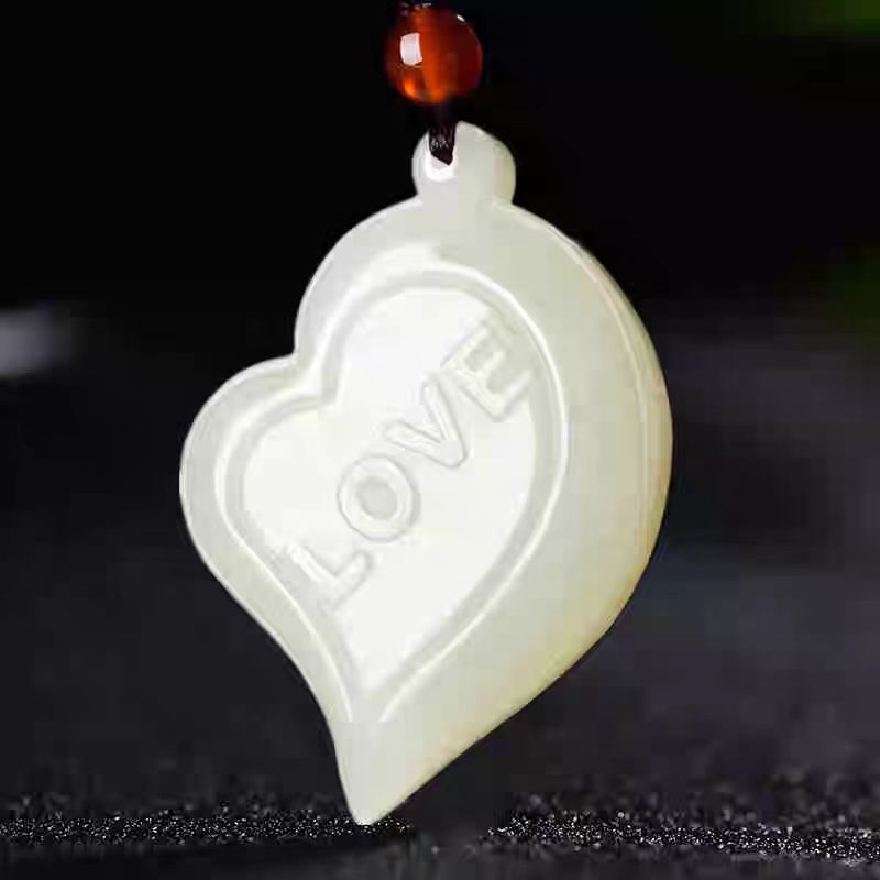 A pair of white jade couples with jade pendants for men and women