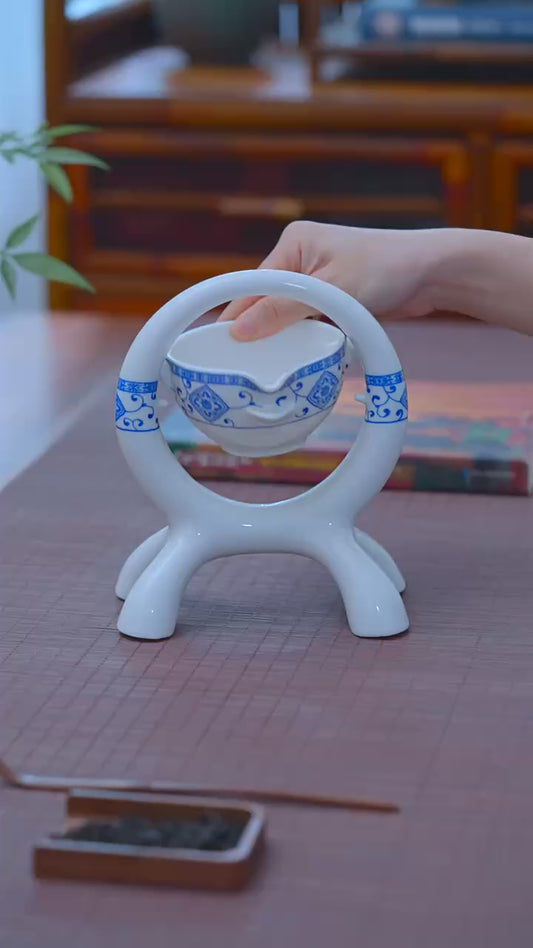 Lazy semi -automatic tea set ceramic home, flip the water out of the water